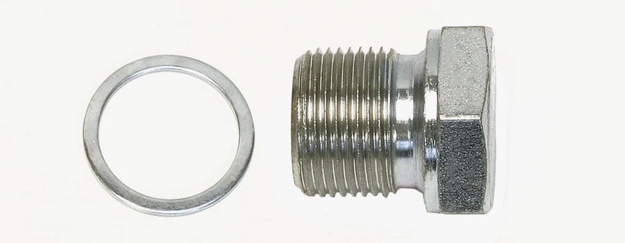 Stainless steel and carbon steel shoulder plugs for heat exchangers